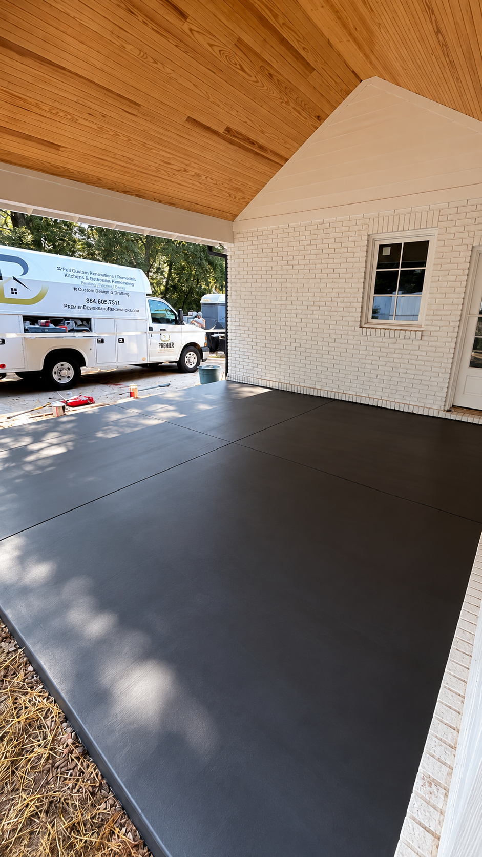 Renovated patio with charcoal concrete finish